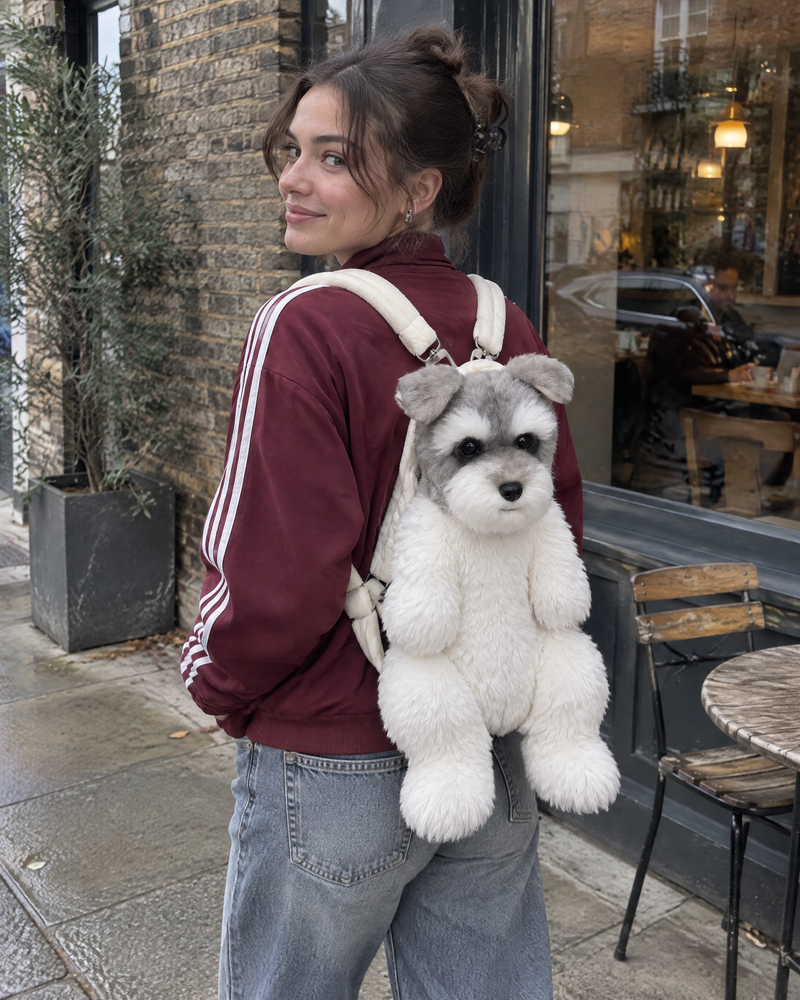 Schnauzer | Plush backpack worn outside a neighbourhood cafe